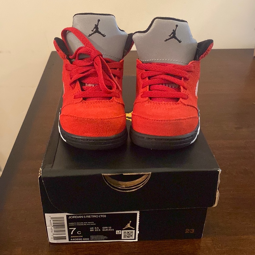 Red, black and white toddler Jordan 5 Retro.